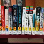 Shelf of new books