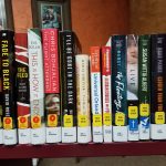 Shelf of new books