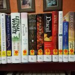 Shelf of new books