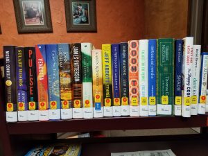 Shelf of new books