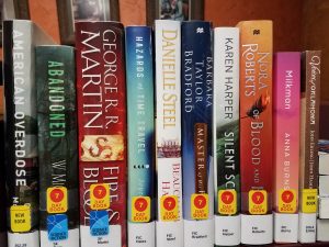 Shelf of new books