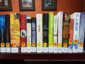 Shelf of new books
