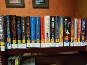 Shelf of new books
